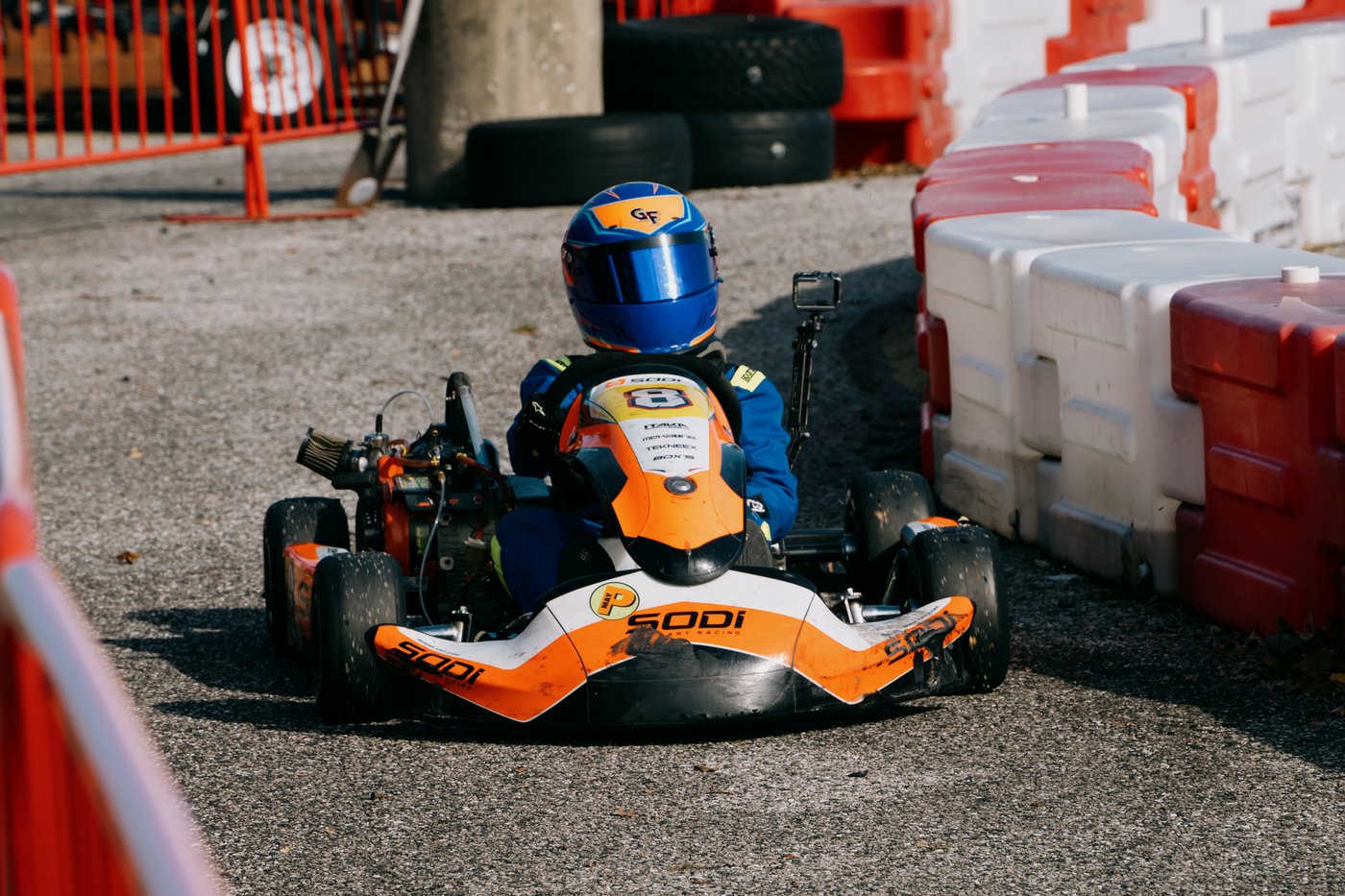 Kaz working through a corner, No. 8 visible on the rear panel